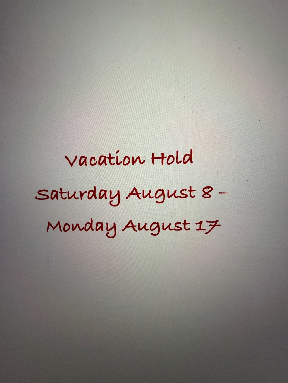 Text Graphic Sign - Red Script on White Background